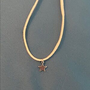 Star Pendant on Cream Cord Necklace